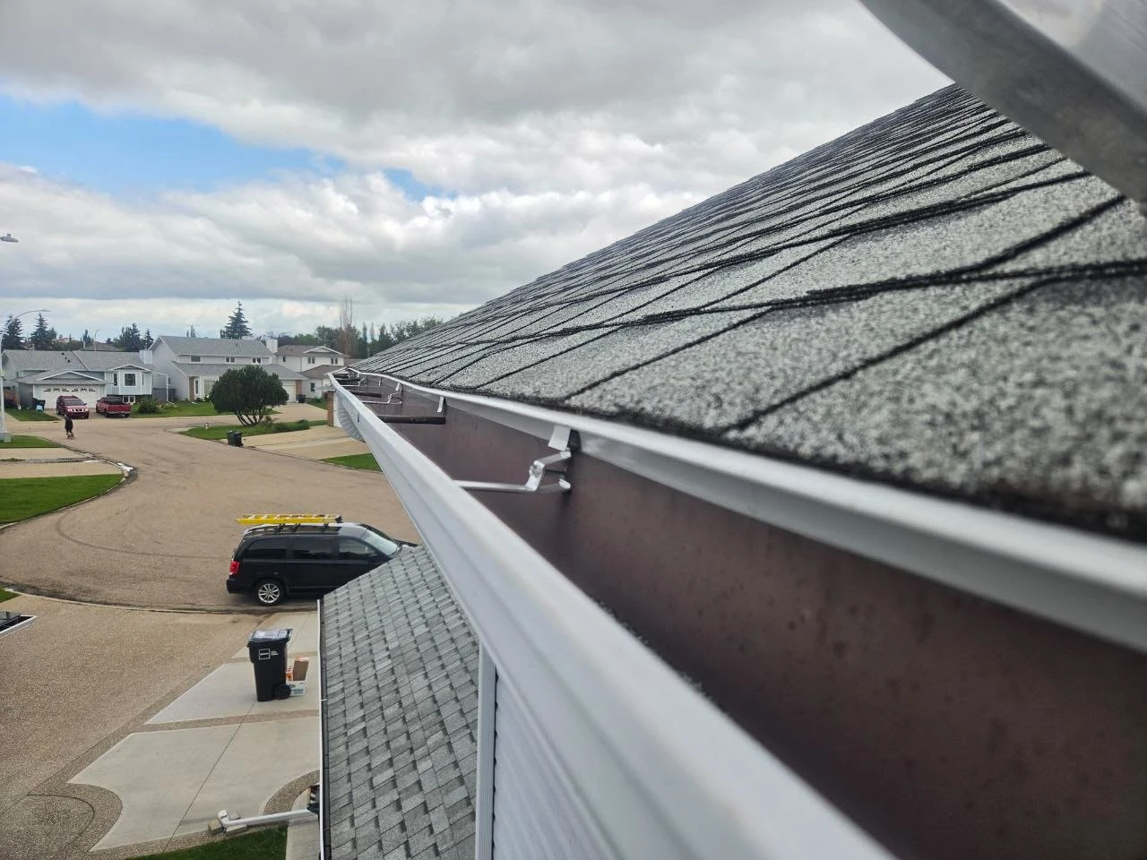 Drip edge installed along a residential gutter line